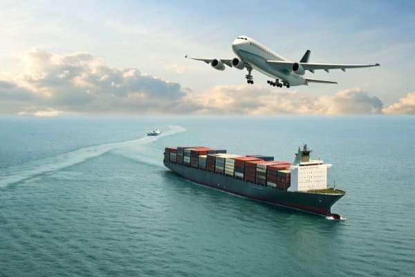 A cargo ship and a plane representing freight forwarding from China to UK