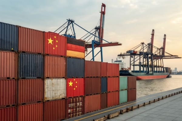 Shipping containers at a port, representing freight from China to Germany