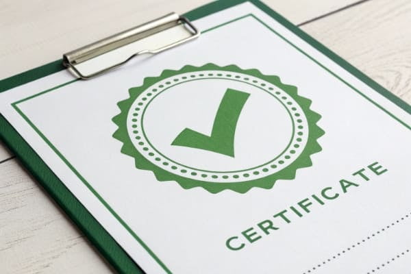 a compliance certificate document with a green checkmark