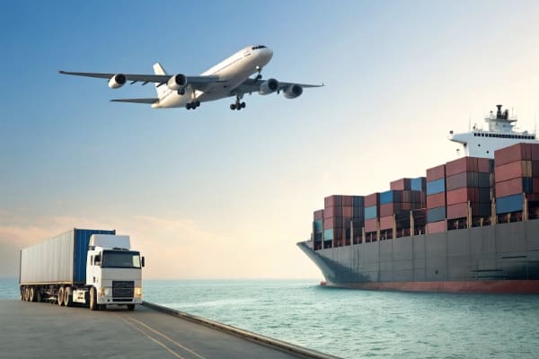 A cargo ship and an airplane showing different shipping options