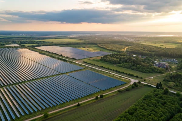 An aerial view showing the vast land area of a solar farm