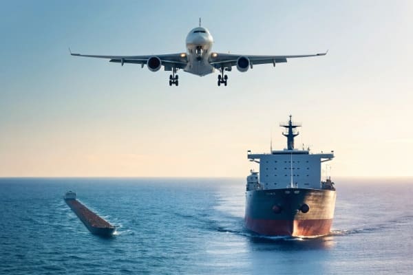 cargo plane and ship composite image